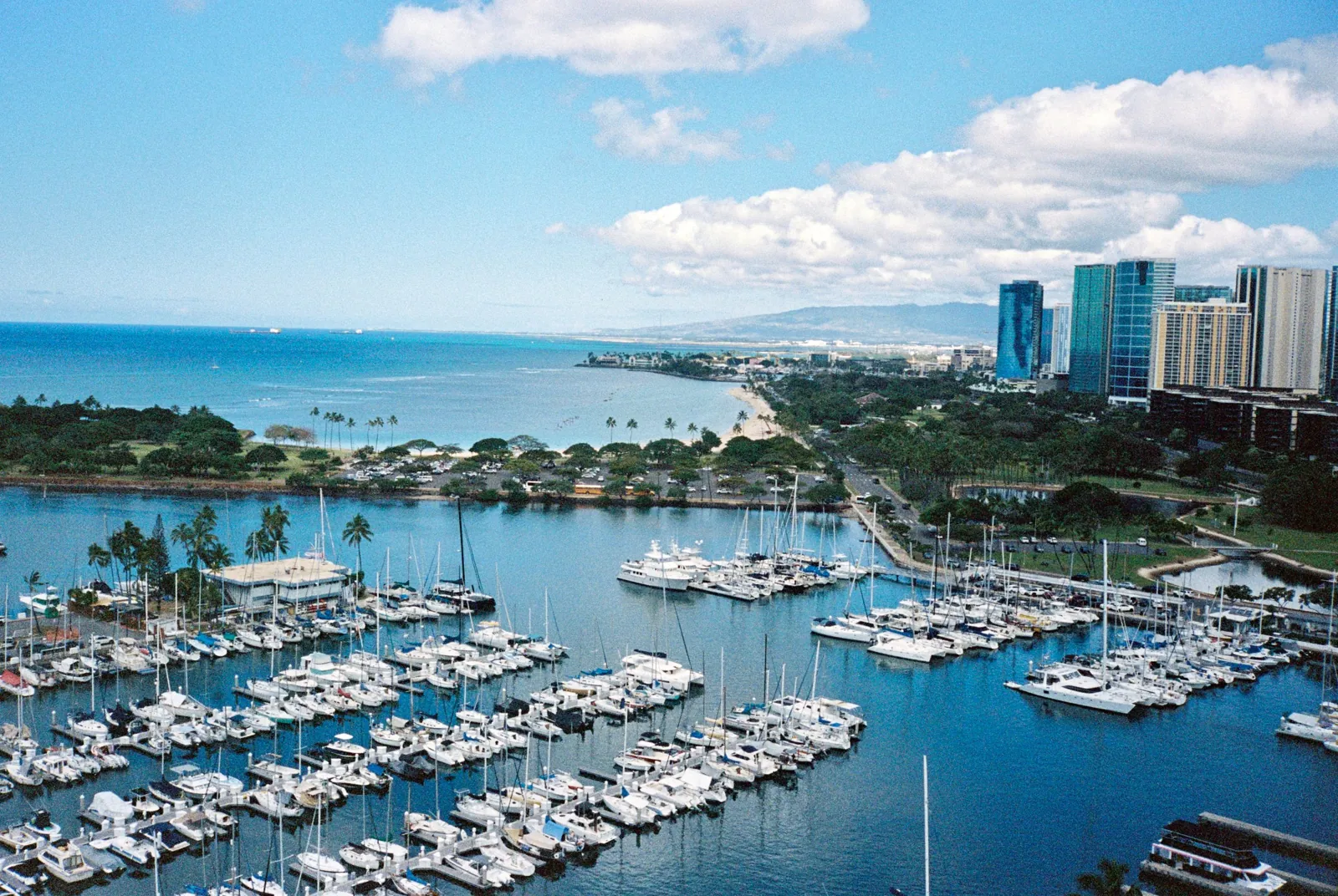 Aerial view of an Oahu harbor full of boats — the complete Hawaii boat owner's guide
